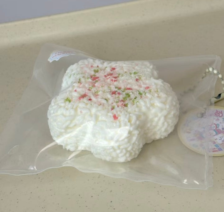 White cherry blossom shaped Rice and vegetable roll soft squishy toys